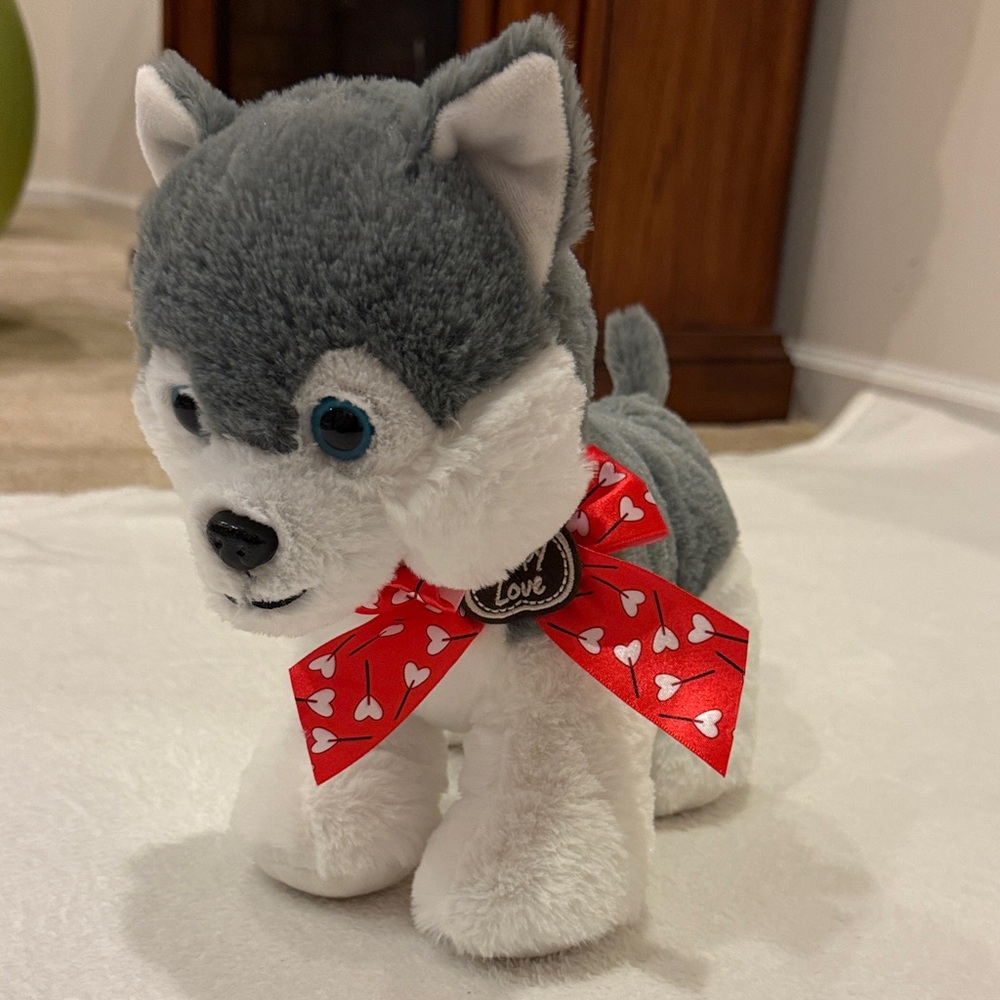 Gray and White Plush Dog Toy with Red Bow